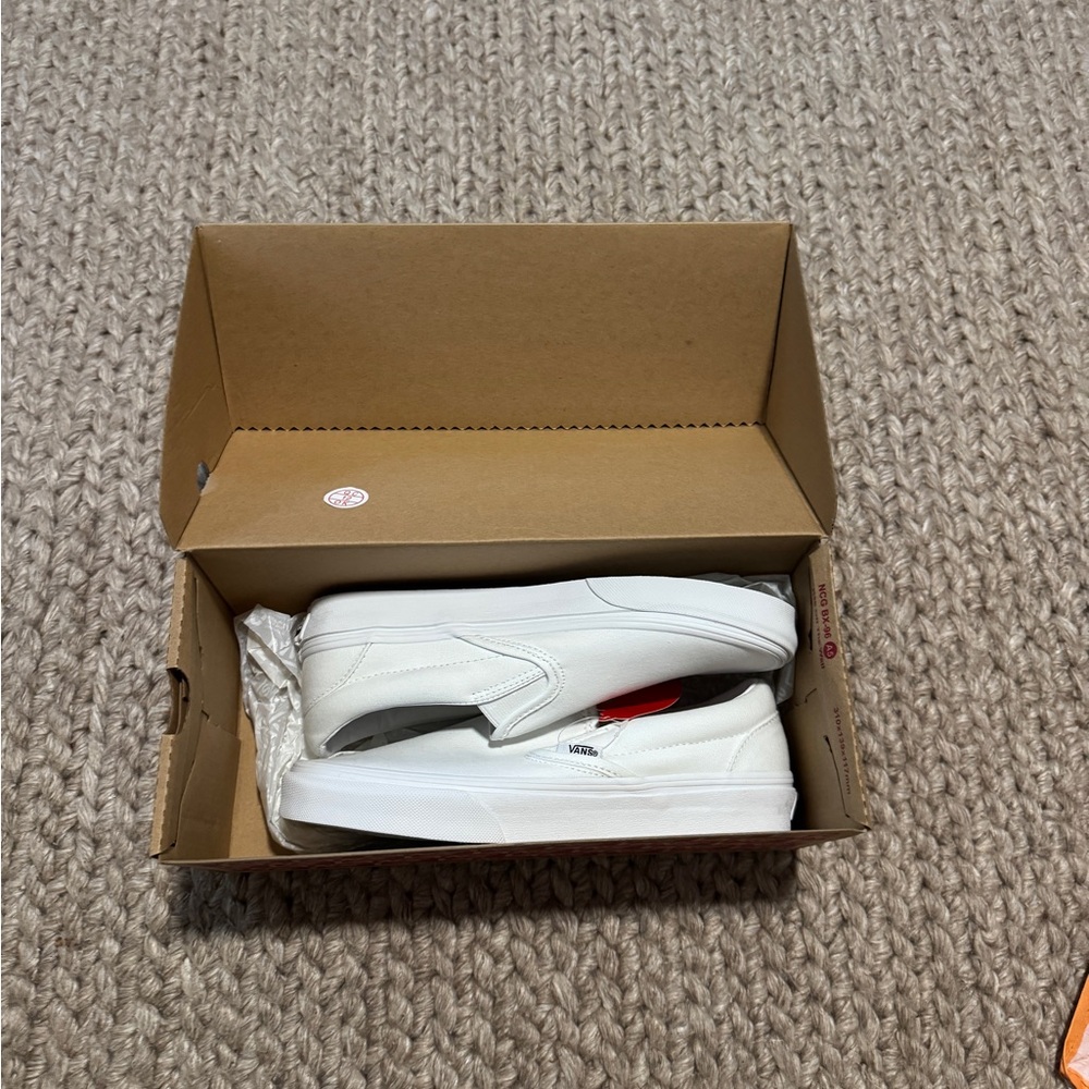 Vans White Slip-On Sneakers